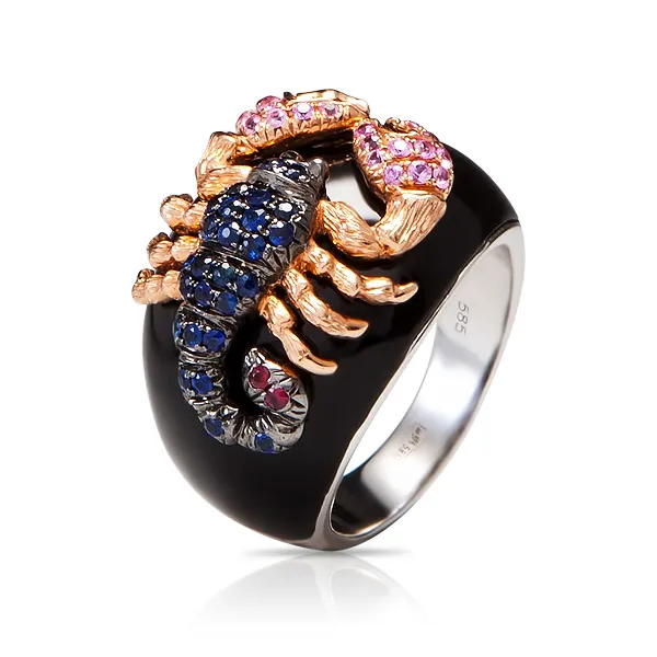 Женское кольцо из золота с ониксом, рубином и сапфиром