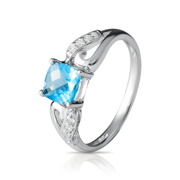 Женское кольцо из золота с бриллиантом и топазом