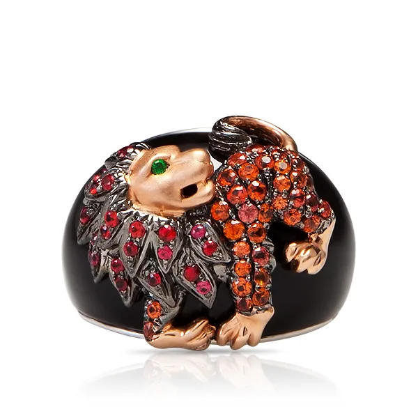 Женское кольцо из золота с гранатом, ониксом и сапфиром