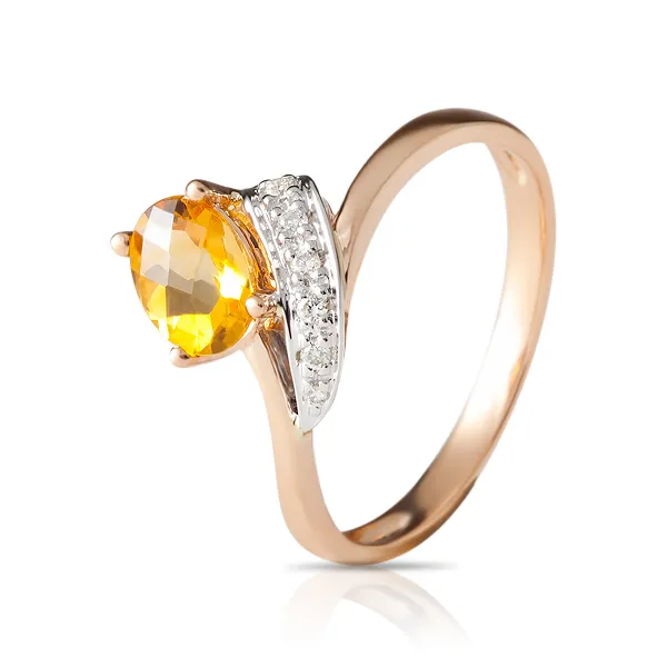 Женское кольцо из золота с бриллиантом и цитрином