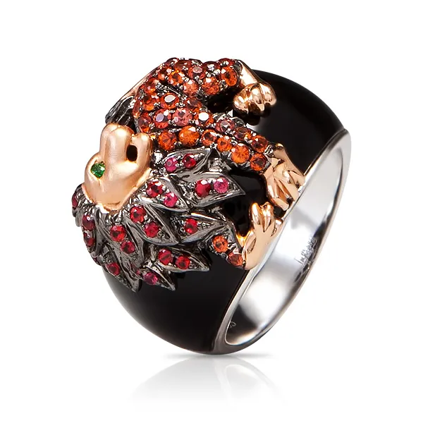 Женское кольцо из золота с гранатом, ониксом и сапфиром